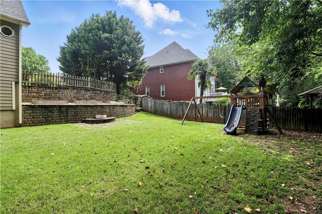 5807 Brookstone Walk NW, Acworth, GA 30101 - fenced backyard with a playground
