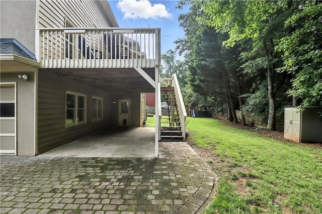 5807 Brookstone Walk NW, Acworth, GA 30101 - view of grassy yard with stairs, a patio area, a storage unit, and a deck