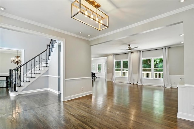 5807 Brookstone Walk NW, Acworth, GA 30101 - unfurnished living room featuring a chandelier, wood finished floors, plenty of natural light, crown molding, and wainscoting