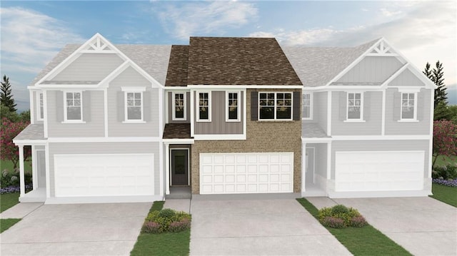 434 Lanier Cir, Woodstock, GA 30189 - view of front of house with a garage, board and batten siding, driveway, and roof with shingles