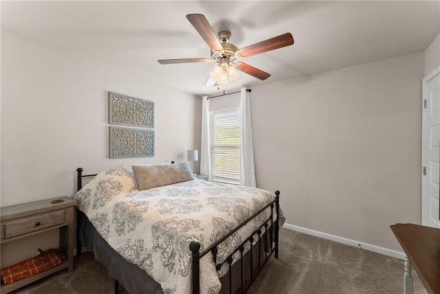 bedroom featuring dark colored carpet, baseboards, and ceiling fan