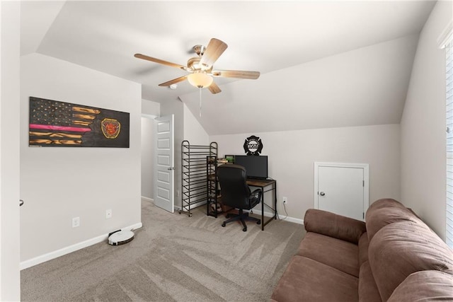 office with vaulted ceiling, carpet floors, ceiling fan, and baseboards