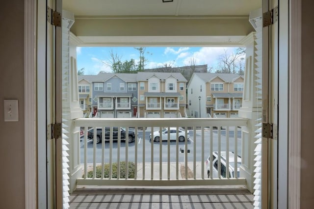 balcony featuring a residential view