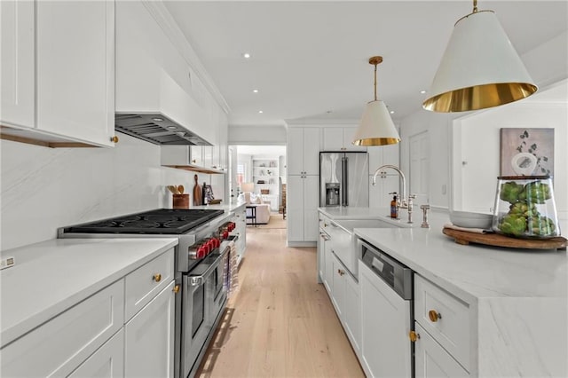 600 Delphinium Blvd NW, Acworth, GA 30102 - kitchen with appliances with stainless steel finishes, white cabinets, light wood-type flooring, pendant lighting, and recessed lighting