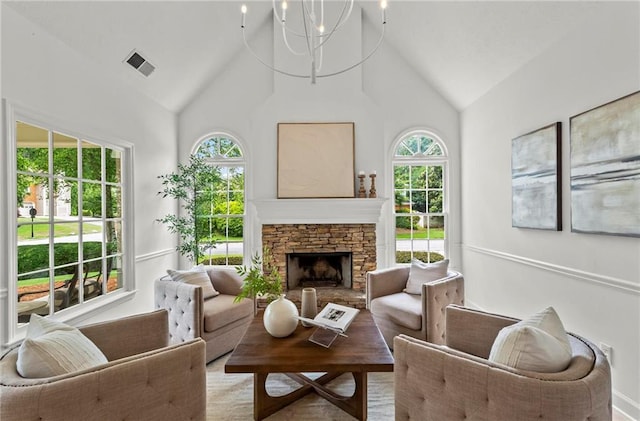 600 Delphinium Blvd NW, Acworth, GA 30102 - living room featuring high vaulted ceiling and a stone fireplace
