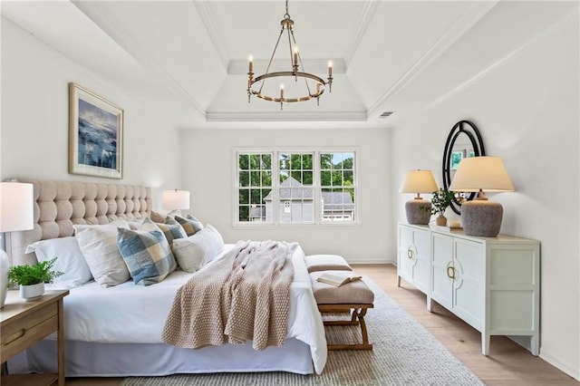 600 Delphinium Blvd NW, Acworth, GA 30102 - bedroom featuring ornamental molding, a tray ceiling, a chandelier, light wood finished floors, and baseboards