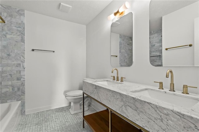 600 Delphinium Blvd NW, Acworth, GA 30102 - bathroom featuring toilet, double vanity, and tile patterned floors