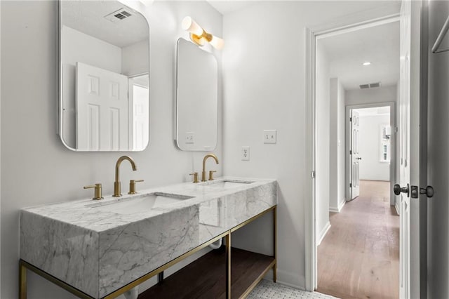 600 Delphinium Blvd NW, Acworth, GA 30102 - bathroom with double vanity, baseboards, and recessed lighting