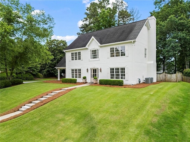 600 Delphinium Blvd NW, Acworth, GA 30102 - view of front of home with cooling unit, a shingled roof, and stucco siding