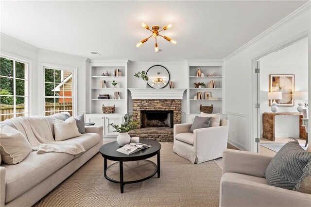 600 Delphinium Blvd NW, Acworth, GA 30102 - living area with a fireplace, crown molding, and built in shelves