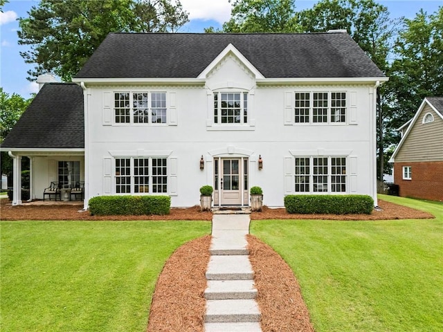 600 Delphinium Blvd NW, Acworth, GA 30102 - colonial-style house featuring a front lawn and roof with shingles