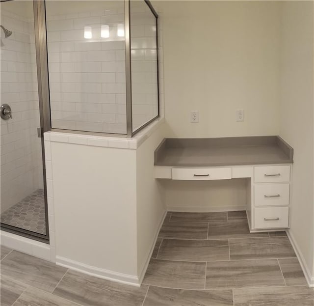 bathroom with an enclosed shower