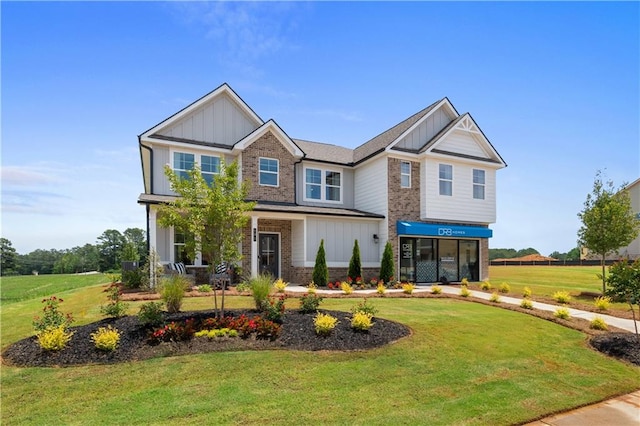 craftsman inspired home with a front yard