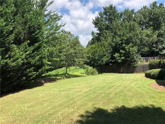 view of yard featuring fence