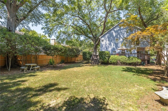 view of yard with a deck