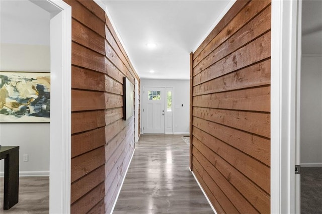389 Oglesby Bridge Rd SE, Conyers, GA 30094 - hall featuring wooden walls, wood finished floors, recessed lighting, and baseboards