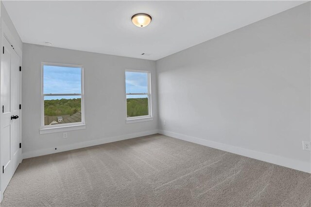 6811 Cambridge Dr, Flowery Branch, GA 30542 - view of carpeted spare room