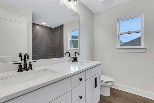 6811 Cambridge Dr, Flowery Branch, GA 30542 - bathroom with toilet and vanity