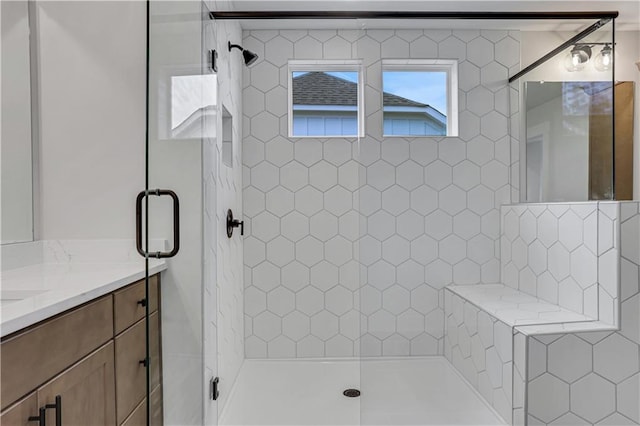 6811 Cambridge Dr, Flowery Branch, GA 30542 - bathroom with tile patterned flooring, a shower with shower door, and vanity