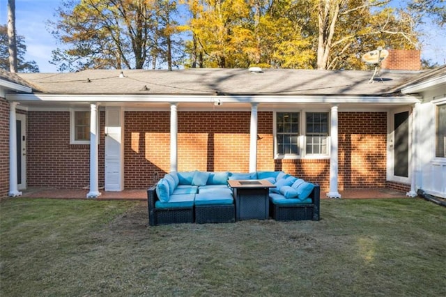 200 Mcguirts Bridge Rd, Covington, GA 30014 - rear view of property featuring an outdoor hangout area, brick siding, and a yard