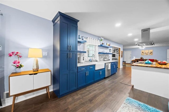 200 Mcguirts Bridge Rd, Covington, GA 30014 - kitchen featuring blue cabinets, island exhaust hood, a sink, stainless steel dishwasher, and open shelves