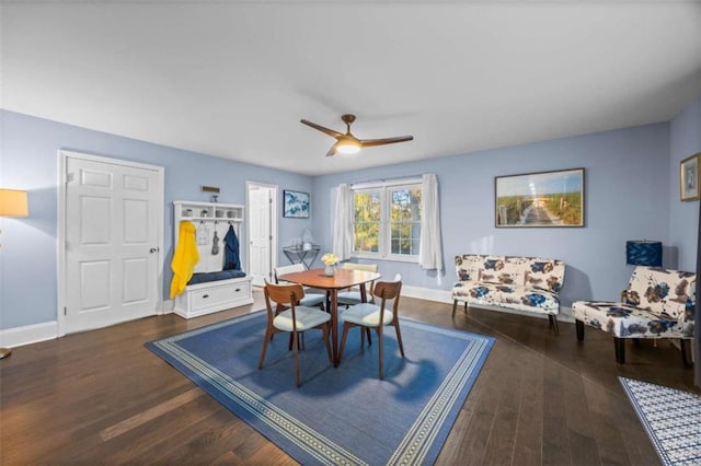 200 Mcguirts Bridge Rd, Covington, GA 30014 - dining room with ceiling fan, wood finished floors, and baseboards