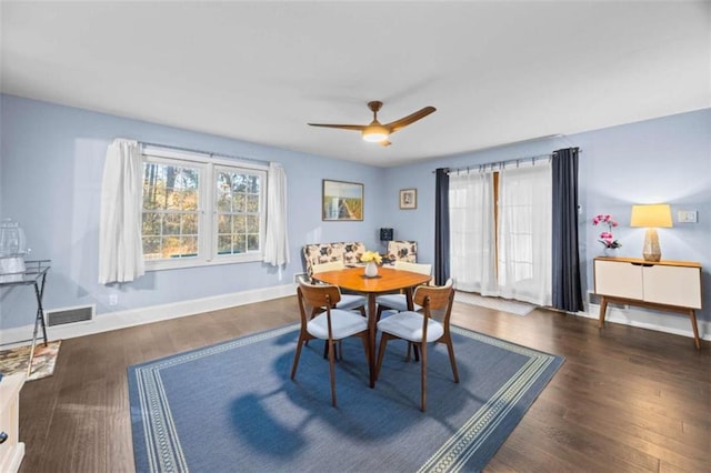 200 Mcguirts Bridge Rd, Covington, GA 30014 - dining room with wood finished floors, baseboards, and ceiling fan