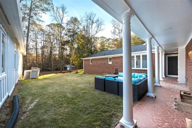 200 Mcguirts Bridge Rd, Covington, GA 30014 - view of grassy yard featuring an outdoor hangout area and a patio area