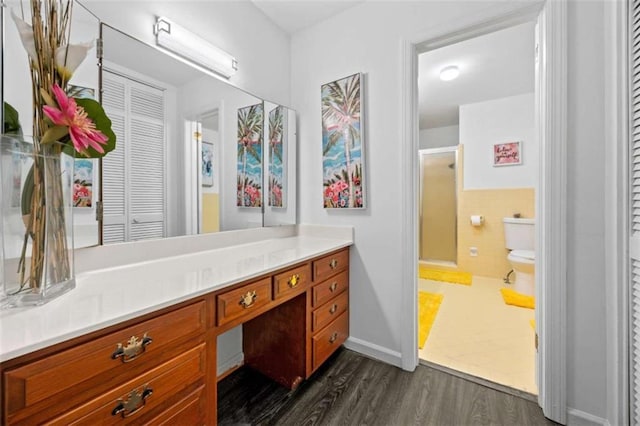200 Mcguirts Bridge Rd, Covington, GA 30014 - bathroom with a closet, wood finished floors, toilet, and vanity