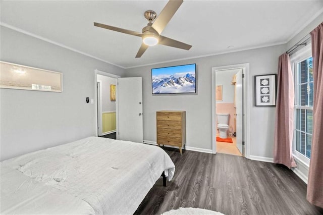 200 Mcguirts Bridge Rd, Covington, GA 30014 - bedroom featuring dark wood finished floors, crown molding, a ceiling fan, baseboards, and ensuite bath