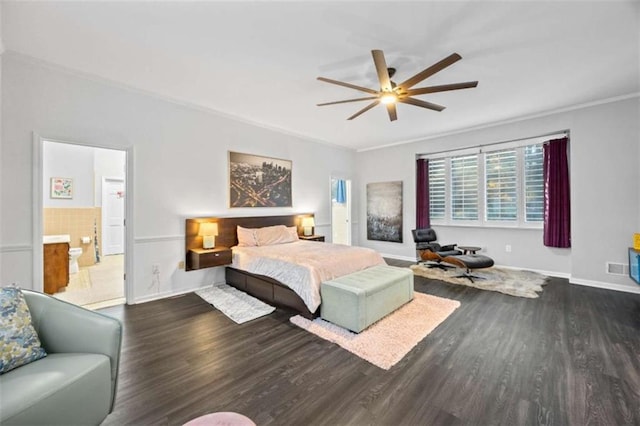 200 Mcguirts Bridge Rd, Covington, GA 30014 - bedroom with wood finished floors, ornamental molding, baseboards, ceiling fan, and connected bathroom