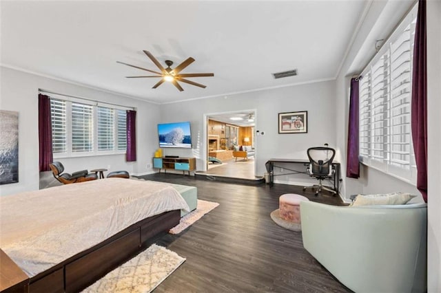 200 Mcguirts Bridge Rd, Covington, GA 30014 - bedroom with crown molding, wood finished floors, and a ceiling fan