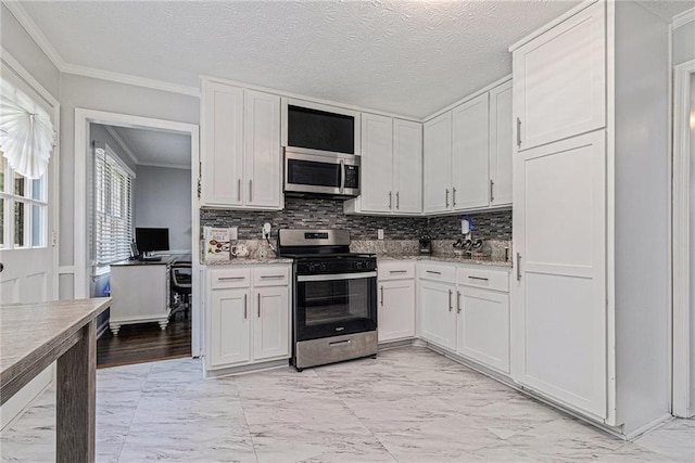 6492 Swift Creek Rd, Lithonia, GA 30058 - kitchen featuring appliances with stainless steel finishes, light marble finish floors, ornamental molding, decorative backsplash, and white cabinetry