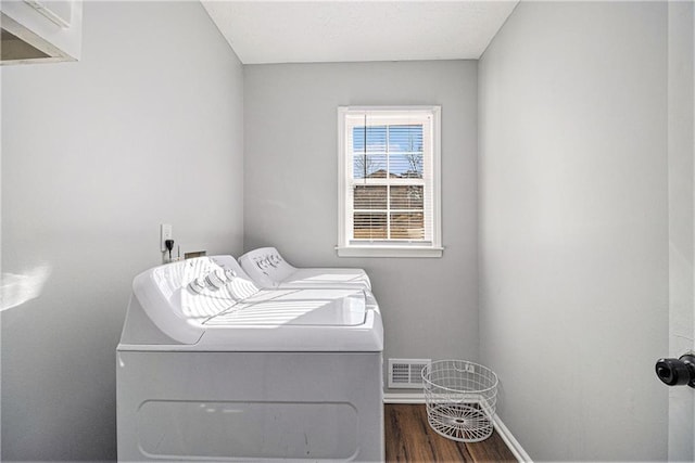6492 Swift Creek Rd, Lithonia, GA 30058 - washroom featuring independent washer and dryer and wood finished floors