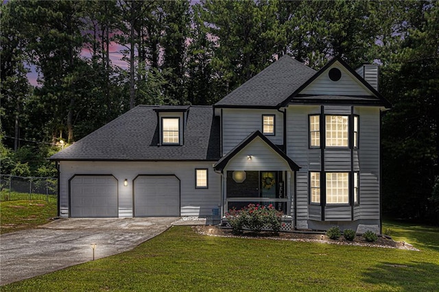 6492 Swift Creek Rd, Lithonia, GA 30058 - view of front of house with a chimney, driveway, an attached garage, a shingled roof, and view of wooded area