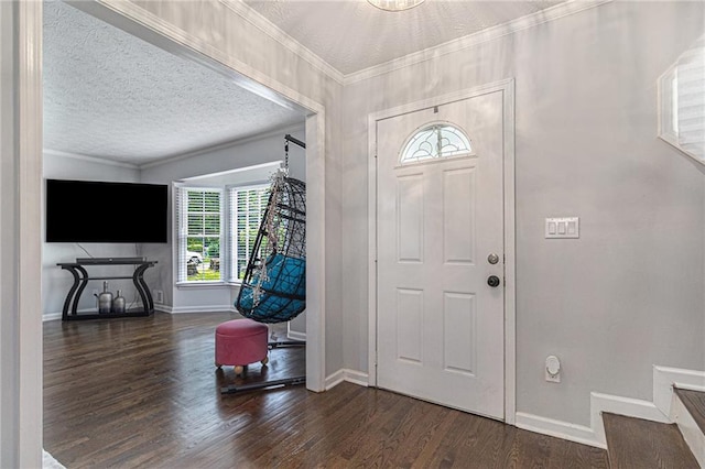 6492 Swift Creek Rd, Lithonia, GA 30058 - foyer with wood finished floors, a textured ceiling, ornamental molding, and stairs