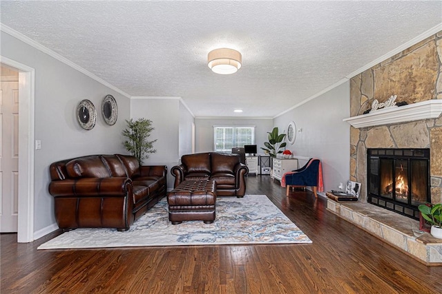 6492 Swift Creek Rd, Lithonia, GA 30058 - living area with wood finished floors, a textured ceiling, a stone fireplace, and crown molding