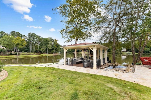 view of dock featuring a yard and a water view