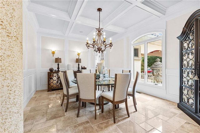 dining area with coffered ceiling, beamed ceiling, crown molding, and a chandelier