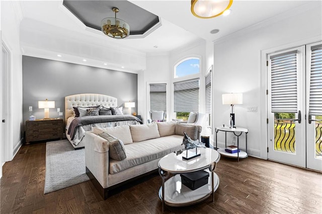 bedroom with french doors, ornamental molding, access to exterior, and dark hardwood / wood-style flooring