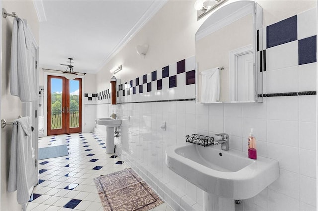 bathroom featuring ornamental molding, sink, french doors, tile walls, and tile patterned flooring