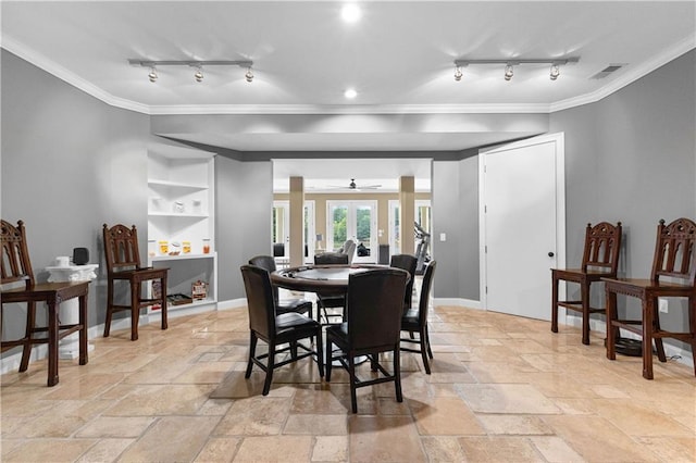 dining room with ornamental molding, ceiling fan, and rail lighting