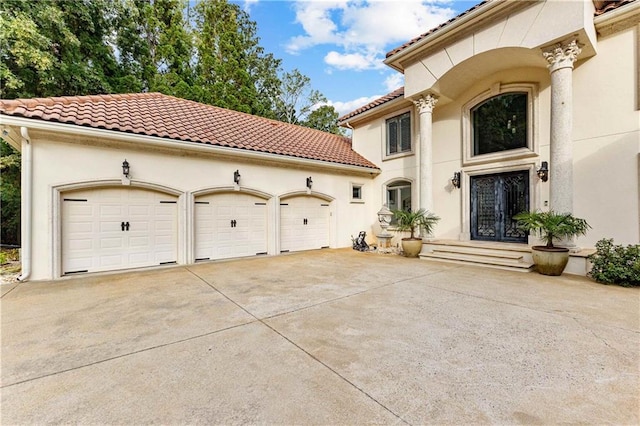 exterior space with a garage