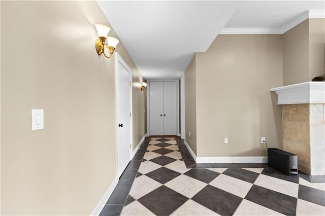 corridor featuring crown molding