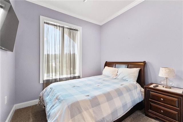 carpeted bedroom featuring crown molding