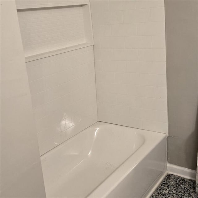 6354 Shannon Pkwy Unit 20D, Union City, GA 30291 - full bathroom featuring a bathing tub and baseboards