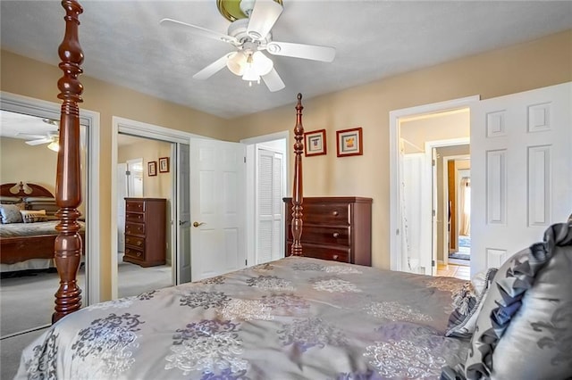 bedroom featuring two closets and ceiling fan