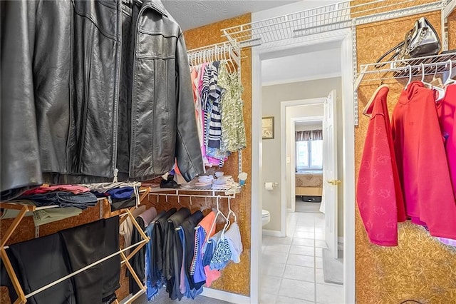 spacious closet with tile patterned flooring