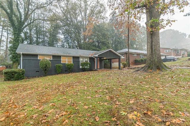 ranch-style house with a front lawn