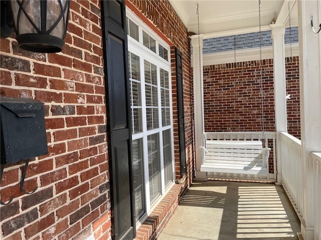 balcony featuring covered porch